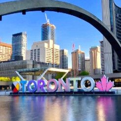 Image of Toronto sign overlooking water